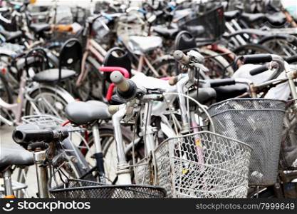 Plenty bicycles at parking lot in Beijing, China
