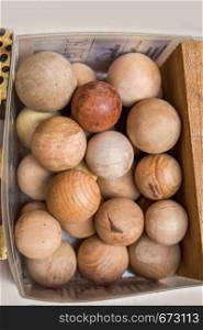 Plenty of wooden balls of light brown color