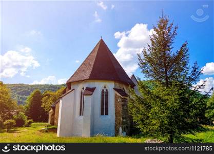 Plesivec, Slovakia, 14 May 2019: Old gothic church in Plesivec Selective focus. Plesivec, Slovakia, 14 May 2019: Old gothic church in Plesivec. Selective focus.