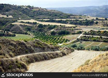 Plowed fields near hills in Cyprus