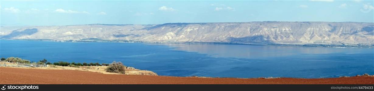Plowed land and Kinneret lake in Israel