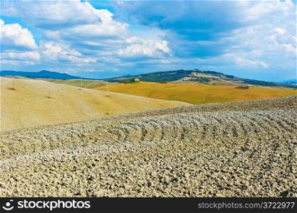 Plowed Sloping Hills of Tuscany in the Autumn