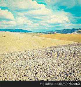 Plowed Sloping Hills of Tuscany in the Autumn, Retro Effect