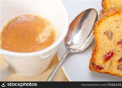 plum cake and espresso coffee over a white rustic table