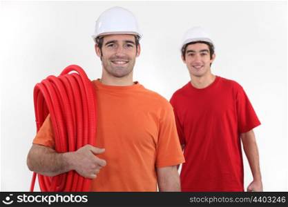 Plumber and assistant
