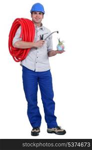 plumber carrying hose
