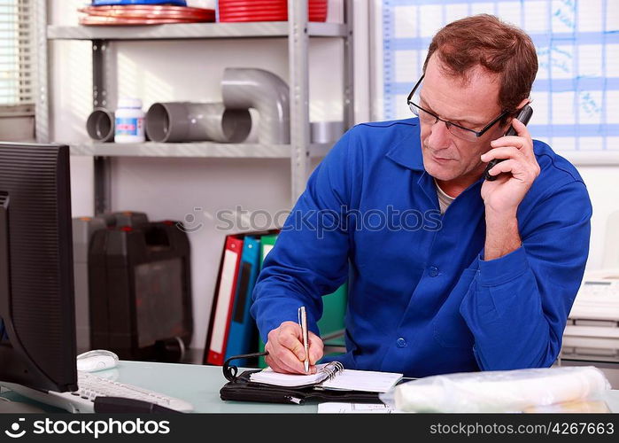 Plumber in the office