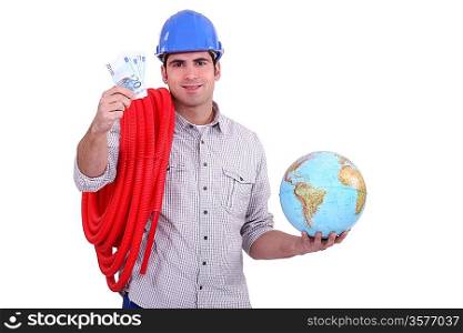 Plumber with a globe and handful of money