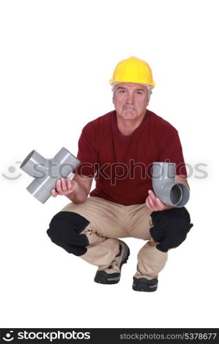 Plumber with plastic pipes