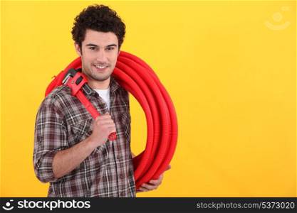 Plumber with wrench
