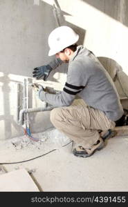 Plumber working on a site