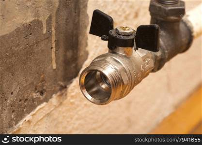 Plumbing pipe with valve for installation of a radiator