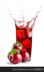 Plums and a glass of plum juice with splash isolated on white background. Plums and a glass of plum juice with splash