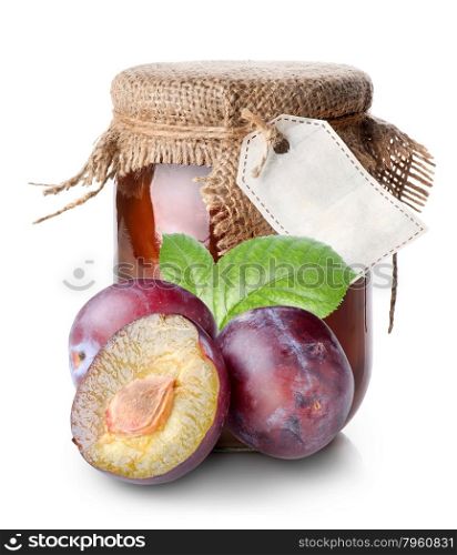 Plums and confiture in a jar isolated on white