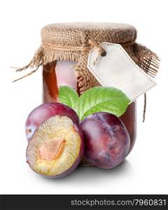 Plums and confiture in a jar isolated on white