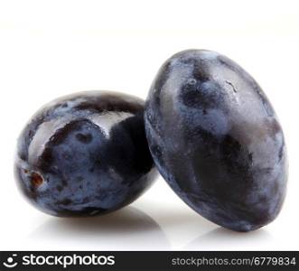 Plums On A White Background