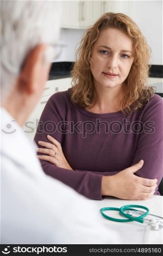 Plus Size Woman In Meeting With Doctor