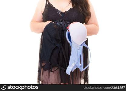 Plus size woman wearing lingerie holding bra, on white. Bosom, brafitting, underwear and female dilemmas.. Woman plus size holding bra