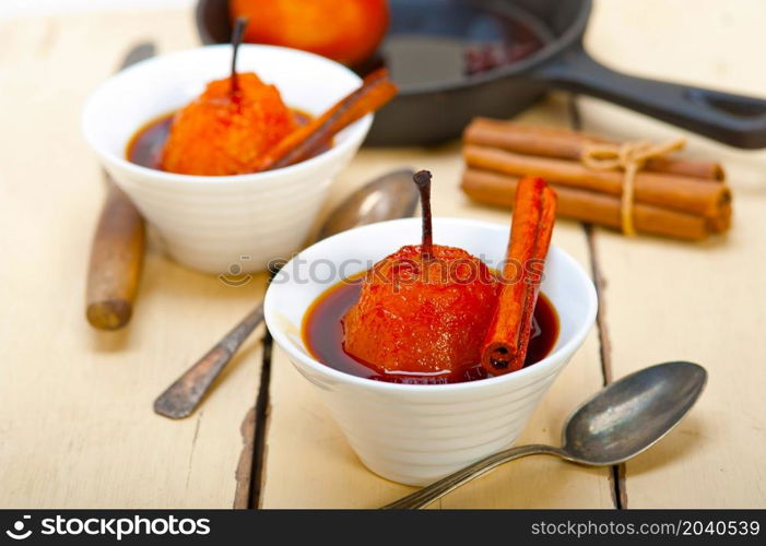 poached pears delicious home made recipe ove white rustic wood table