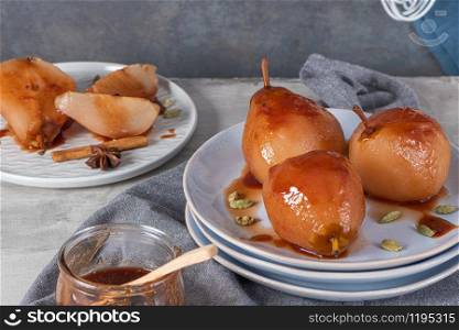 Poached pears delicious home made recipe over light kitchen countertop