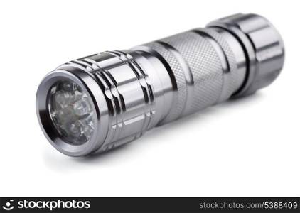 Pocket metal led flashlight isolated on white