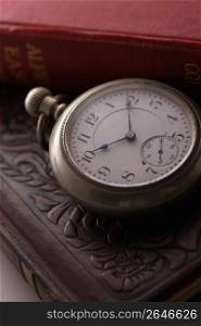 Pocket watch and Book