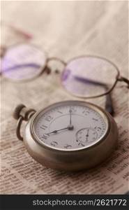 Pocket watch and Glasses