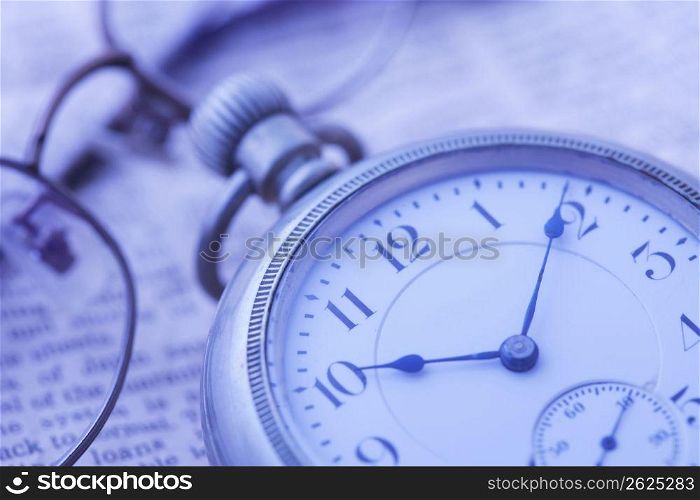 Pocket watch and Glasses