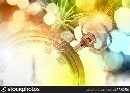 Pocket watch. Conceptual image with pocket watch bokeh lights and fireworks