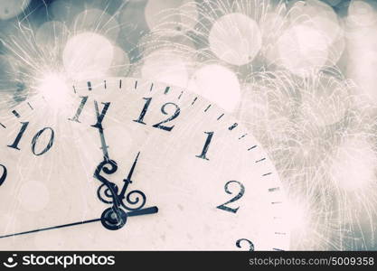 Pocket watch. Conceptual image with pocket watch bokeh lights and fireworks