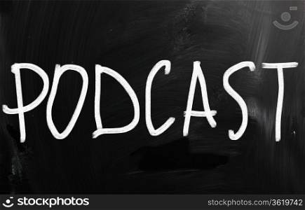 ""Podcast" handwritten with white chalk on a blackboard"