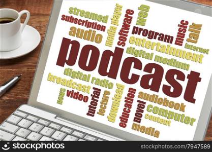 podcast word cloud on a laptop screen with a cup of coffee - internet broadcasting concept
