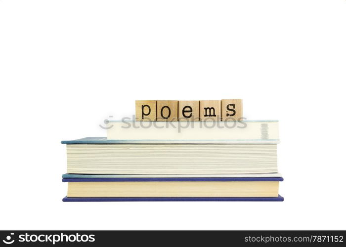 poems word on wood stamps stack on books, poetry and literature concepts