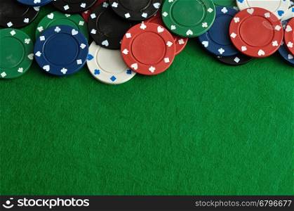 Poker chips forming a border on the right with a green background