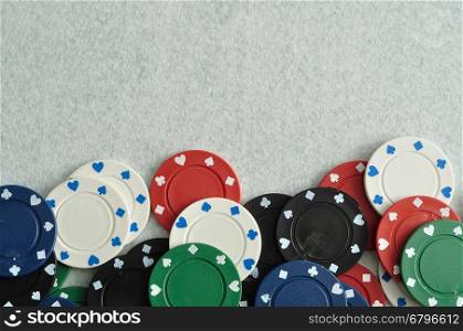 Poker chips forming a border with a white background