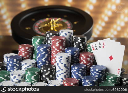 Poker Chips on gaming table, roulette