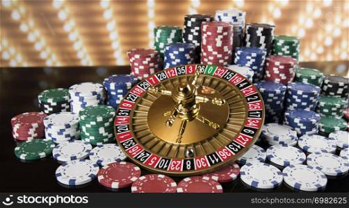 Poker Chips on gaming table, roulette wheel in motion, casino background