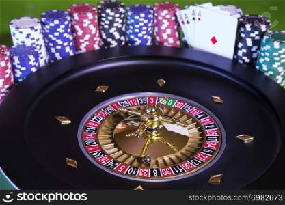 Poker Chips on gaming table, roulette wheel in motion, casino background