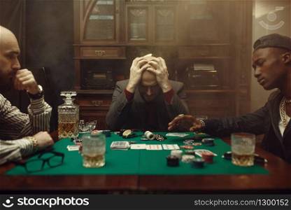 Poker player spend all money in casino, risk. Games of chance addiction, gambling house. Men leisures with whiskey and cigars