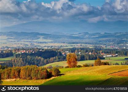 Poland autumn hills. Sunny October day in Malopolska mountain village. Fall in Poland