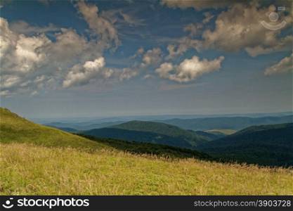 Poland,summer.Bieszczady mountins.Extensive, lightly blurred view on distant peaks