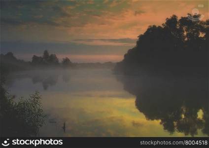 Poland,summer foggy sunrise over the Bug river ,on the border with Ukraine,fabulous colors of the sky and its reflection in water.Horizontal view.