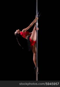 Pole dancer isolated on black