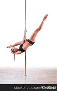 Pole dancer isolated on white