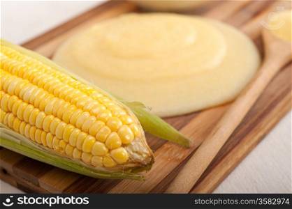 polenta traditional north Italy corn maize flour cream with cob