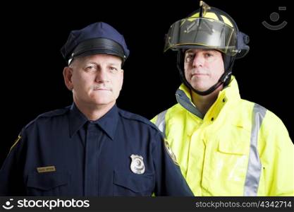 Police officer and fire fighter portrait on black.