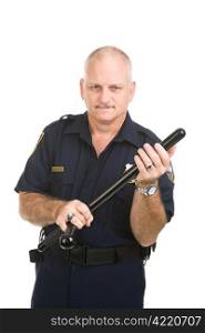 Police officer gets ready to use his night stick. Isolated on white.