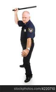 Police officer in aggressive posture, using his night stick. Full body isolated on white.