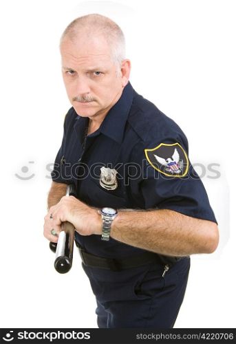 Police officer in an aggressive posture ready to use his night stick. Isolated on white