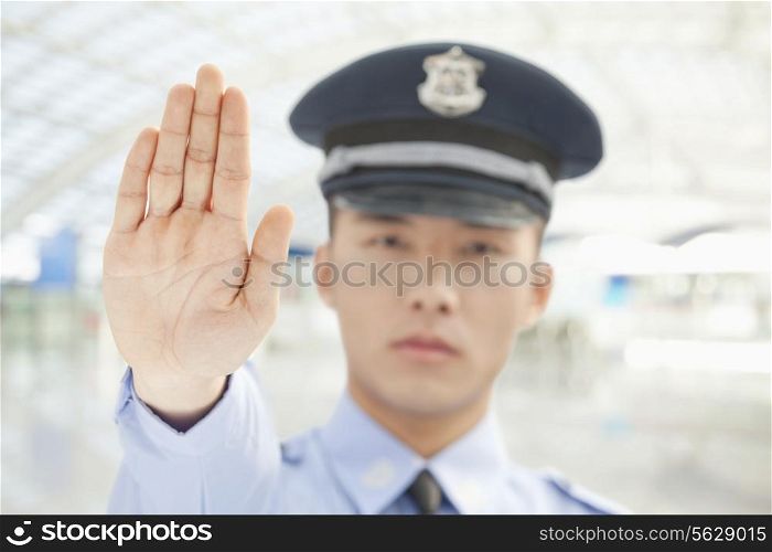 Police Officer Motioning to Stop